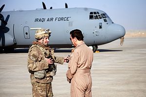 U.S._Air_Force_Col._Rhett_Champagne_speaks_with_the_chief_of_staff_of_the_Iraqi_air_force_at_Q-West_Airfield